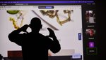 Man's shadow cast upon a presentation screen.