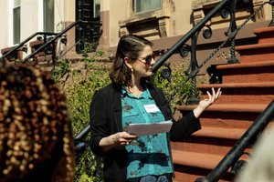 Rebekah Morris, Director of Climate Initiatives at Pratt Center, giving a speech.