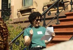Executive Director Alexa Kasdan giving a speech.
