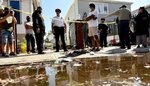 Officials toured a flooded street in Queens the day after the Hurricane Ida, where tenants were killed by floods in a basement apartment.
Michael Appleton/Mayoral Photography Office
